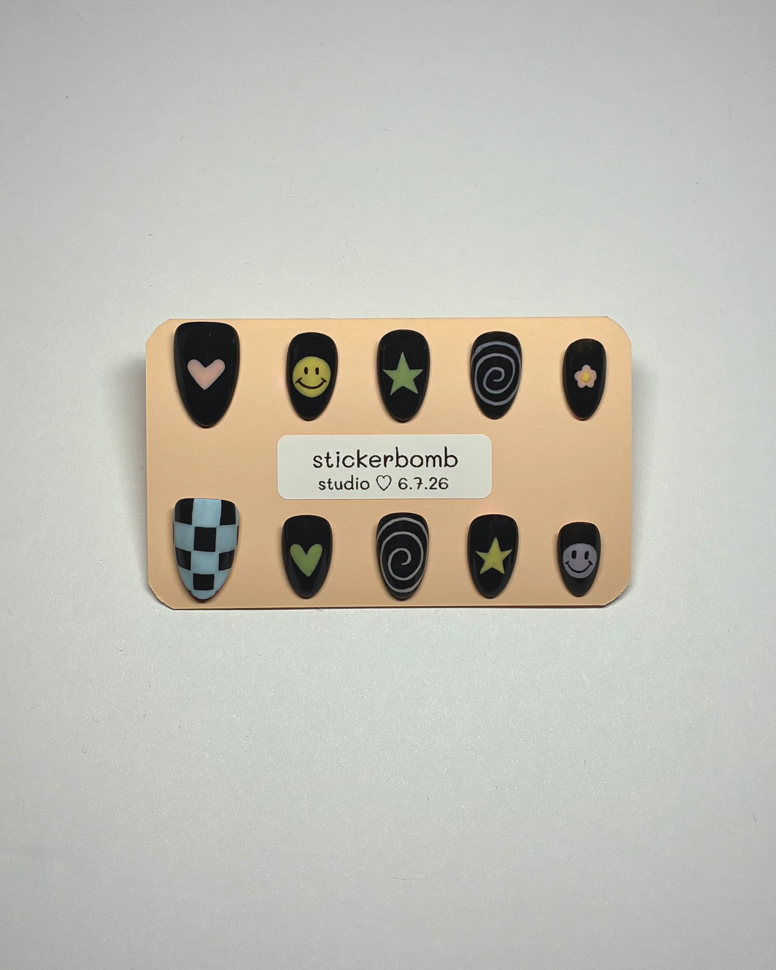 stickerbomb press-on set, photographed by patchwork nails